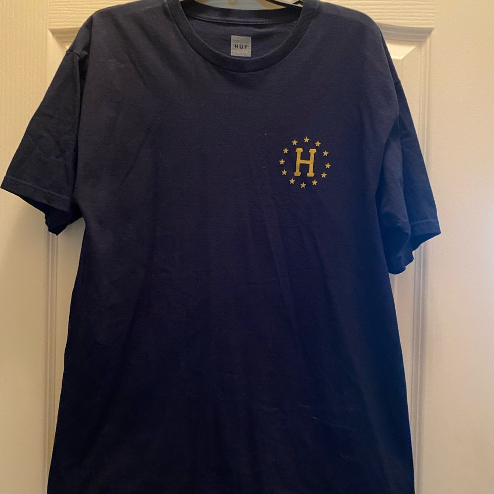 Men HUF short sleeve tee.
